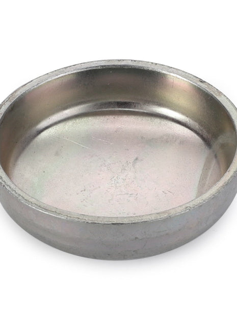 Product Description: AGCO | Cup Plug - 3007458X1 by AGCO. This is a round, shallow metal dish with a smooth interior and edge, presenting a slightly worn or tarnished appearance.