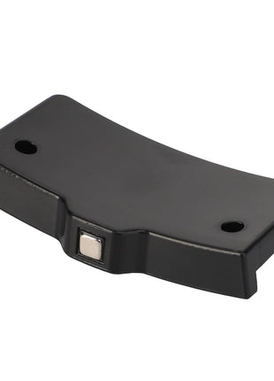 The AGCO Housing - Acw3522130 is a black, rectangular plastic object featuring two holes and a small metallic square in the center. No current product description information is available.