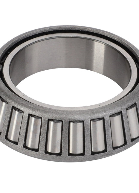 Close-up of the AGCO TAPER ROLLER BEARING - F835300020830, featuring an outer ring and visible tapered rollers inside. This well-crafted bearing, from AGCO, is made of polished metal and cylindrical in shape, showcasing its precision engineering. No current product description information is available for this specific model.