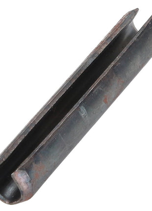 A close-up of the AGCO PIN - D42612200, a meticulously designed dark metal roll pin with a split down its length, ideal for securing parts in precise mechanical assemblies.