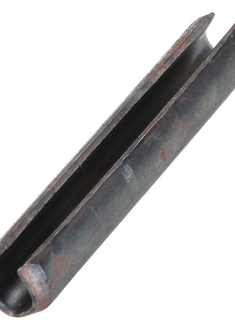 A close-up of the AGCO PIN - D42612200, a meticulously designed dark metal roll pin with a split down its length, ideal for securing parts in precise mechanical assemblies.