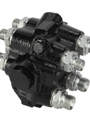 The AGCO Valve Block - Acp0437370, featuring a black hydraulic control mechanism with multiple metal connectors and a central black knob, enhances your system performance and ensures reliability with every use. Quality you can trust from AGCO.