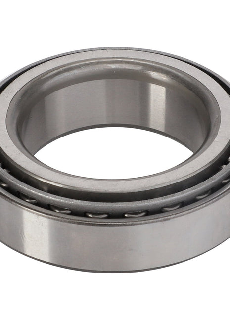 The AGCO Tapered Roller Bearing, Rear Axle - D41662700 is a precisely engineered cylindrical component featuring inner and outer rings designed to minimize friction in mechanical systems while effectively managing thrust loads.