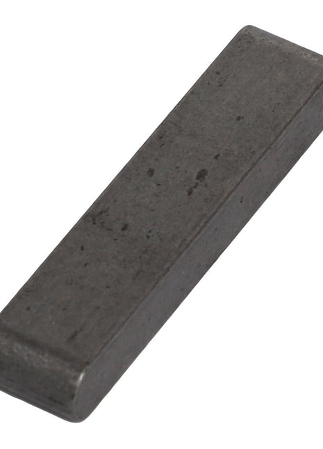 The AGCO | KEY - AG707507 is a rectangular metal key with slightly rounded edges, commonly used for machine parts or locks. No additional product description information is currently available.