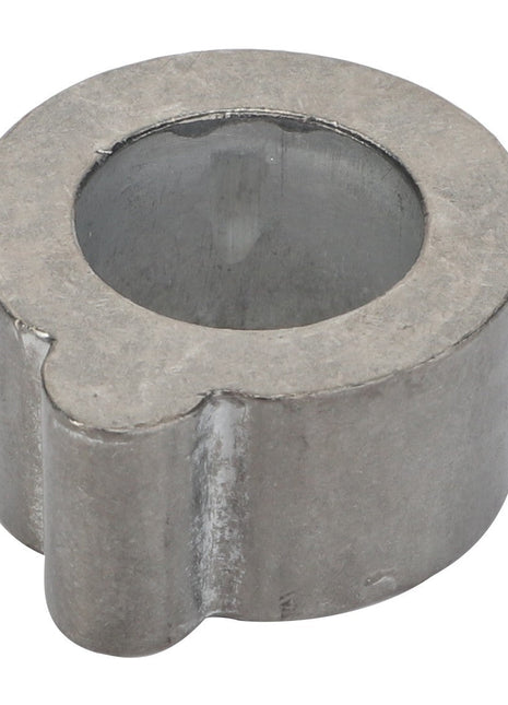 The AGCO Centering Ring - F205200710040 is a cylindrical metal component featuring a hollow center and a small notch on one side. No current product description available for this item.