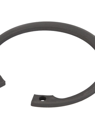 A black circular snap ring, specifically the AGCO Circlip - Acp0442930, with two holes at the ends is placed on a white background. No current product description available.