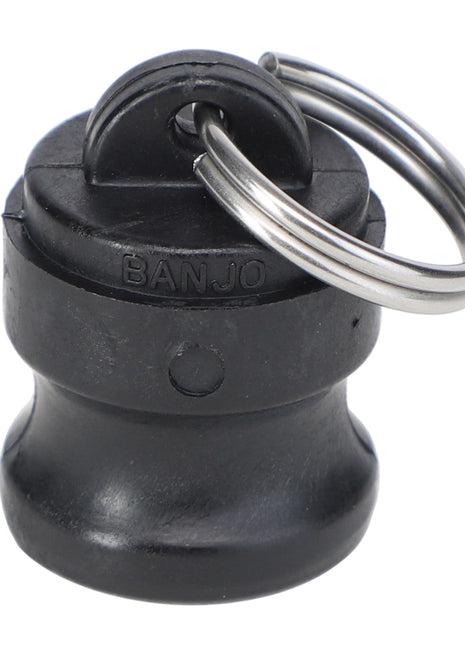 A robust black plastic AGCO Cam Lock Dust Plug (Ag000884) with a sturdy metal ring attached at the top.