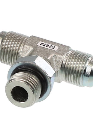 Introducing the AGCO | TEE - AG551120, a metal T-shaped hydraulic fitting from the trusted brand AGCO. This fitting features connectors on all three ends, with one end equipped with a black ring gasket for a secure seal. It also has a small white label with text for identification purposes. Unfortunately, we currently do not have additional product description information available for this item.