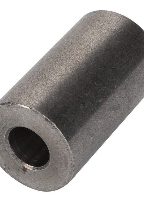 The AGCO Spacer Bushing - F926202710630 is a metallic cylinder featuring a central hollow section that extends through its entire length. Additional product description information is not available.