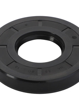 The AGCO | Shaft Seal - Fel108546 is a black, circular mechanical seal featuring a central opening, designed to prevent leakage in machinery. Further details are currently unavailable as there is no product description available.