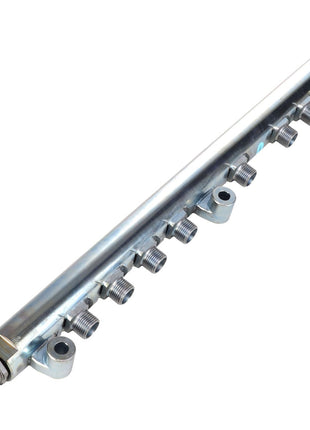 The AGCO Boost Pipe - F530200710220 is a metal fuel rail featuring multiple injector ports and a connector on one end. Currently, there is no detailed product description available.