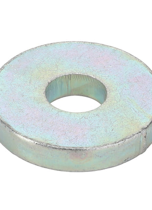 Introducing the AGCO | Special Washer - Acw7492920: a premium metallic washer with a central hole. This product features a shiny, slightly iridescent surface, courtesy of the trusted AGCO brand.