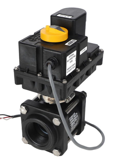 Introducing the AGCO | VALVE - AG727409 by AGCO, an electric actuator valve in black featuring a distinctive yellow control knob and various attached wires. This advanced valve is designed for precise control of liquid or gas flow within pipeline systems.