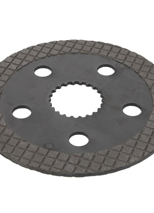 The AGCO Brake Disc - Acp0420620 is a round metal friction plate featuring a grid pattern, five holes, and a central gear-like hole designed for mechanical or automotive applications. Perfect for inclusion in braking systems, this product meets the high-quality standards associated with Genuine AGCO Parts.