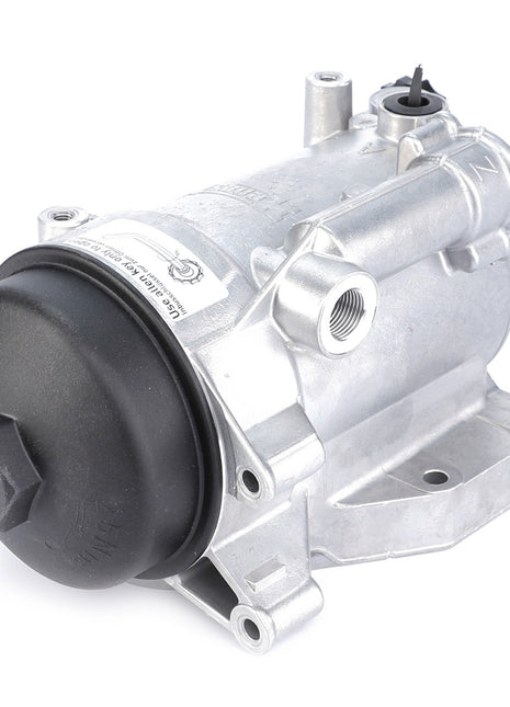 A silver electric motor with a black cover, two mounting brackets, and a connecting port on its side ensures optimal performance, much like the AGCO Fuel Filter Assembly - F530200710360 offering cleaner fuel with its spin-on design.