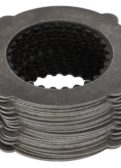 A set of AGCO | Set Of Fins - F416300020010, featuring uniformly stacked gray metal friction plates with grooved inner circles. No Current Product Description Available.