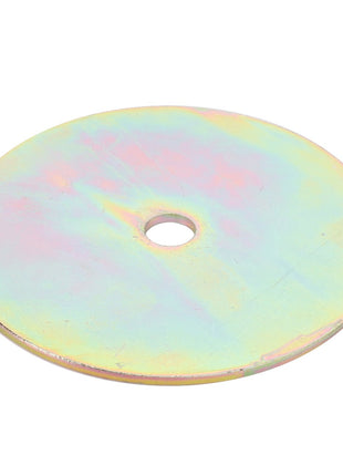 Introducing the AGCO Washer - La300135084: A metallic disc manufactured by AGCO, featuring a central hole and a stunning rainbow-like iridescent surface. For more details, product description is currently unavailable.