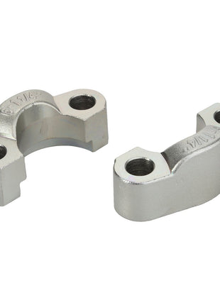 Two AGCO clamp - Acx0132620 silver metallic clamps with circular holes, positioned side by side on a white background. Each clamp has two threaded holes for screws or bolts. No current product description information available.