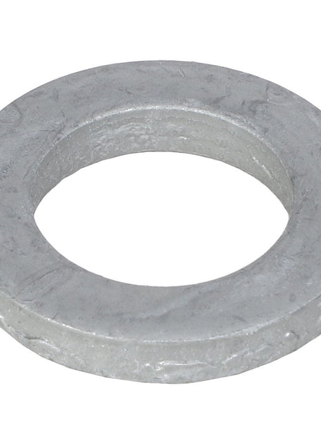A simple gray flat washer made of metal with a circular shape and a central hole, viewed from an angle against a white background—a detailed product depiction of the AGCO | Flat Washer - Acw1628380 by the brand AGCO. No important SEO keywords can be identified from this image alone.