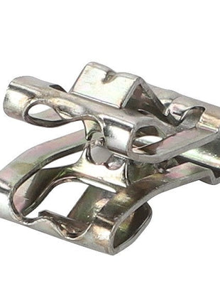 Close-up of the AGCO Fastener - Acw4961880, a metallic presser foot for a sewing machine. The silver foot, with its distinct curved and rectangular shape, shines under the light. No current product description available.