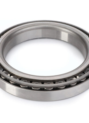 Close-up of the AGCO | Roller Bearing - F514300020260, showcasing its metal construction and inner tapered rolling elements, designed to efficiently manage radial and axial loads.