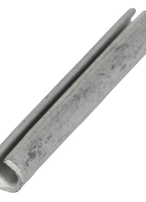 An AGCO | Split Pin - 63107, characterized by its sleek metal design, rests horizontally on a pristine white surface.