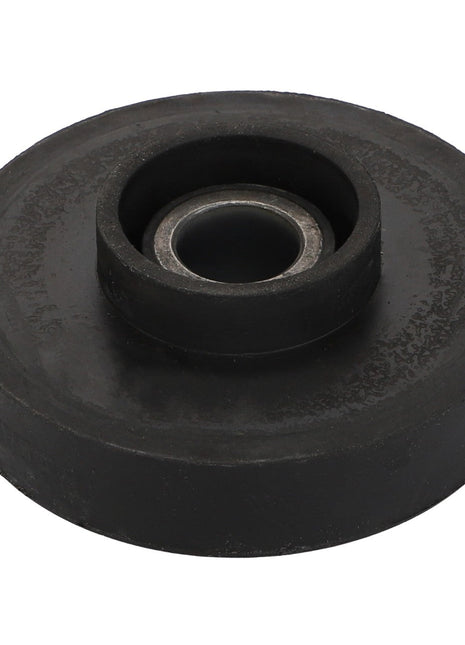 The AGCO Vibration Mount - Acp0674250 features a sleek black rubber wheel with a central metal bearing, viewed from above.