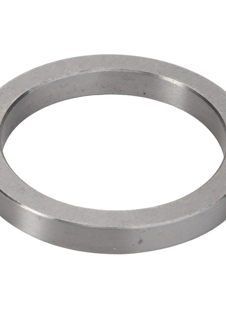 A circular, flat metal washer with a central hole, viewed from an angle against a pristine white background: AGCO | INTERMEDIATE RING - V30386200.