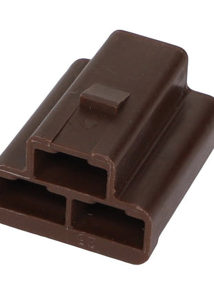 A brown, rectangular plastic connector with three slots for electrical wiring from AGCO—specifically the AGCO | BODY CONNECTOR - AG515171; unfortunately, no current product description information is available.