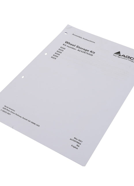 A white instruction manual titled "AGCO | Instructions - Acx2678920," produced by AGCO, for a wheel storage kit. It displays part numbers and assembly instructions and features three hole punches on the side. No current product description is available.