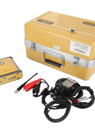 The AGCO HIPER AG BASE STATION KIT - ACZ000123A is a yellow, metal handheld device equipped with multiple ports, an antenna, and cables. It includes a matching yellow case that features a convenient handle and label for easy transport.