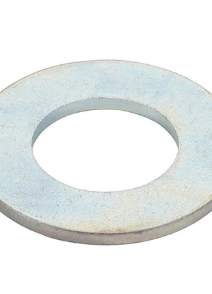 The AGCO | SPACER - D20400537, a robust metallic washer featuring a circular shape and central hole, is typically used to effectively distribute the load of a threaded fastener.