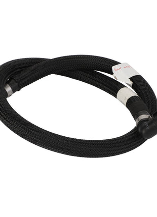 Coiled black braided hose with connectors on each end, featuring a white label attached near one of the connectors. No current product description available. Product Name: AGCO | Hose - Acw014542A Brand: AGCO.