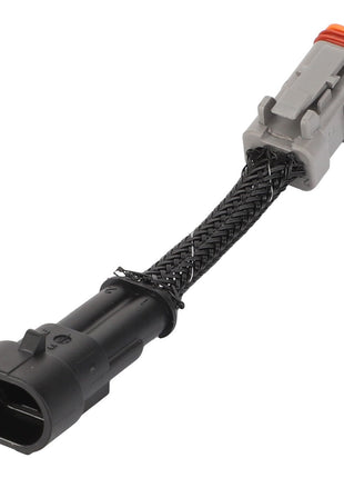 The AGCO | Harness - Acp0246380 by AGCO is a sleek electrical connector in black and gray, featuring a durable black braided wire sheath.