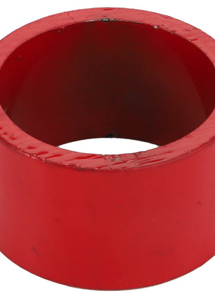 No current product description is available, but the image shows an AGCO Spacer - Acp0003170 from the AGCO brand, which appears to be a red, cylindrical metal ring with a smooth surface and a hollow center, viewed from an angle.