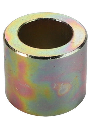 The AGCO Bushing - 1117878 is a cylindrical metal spacer featuring a hollow center and a reflective, iridescent surface similar to bronze bushings.