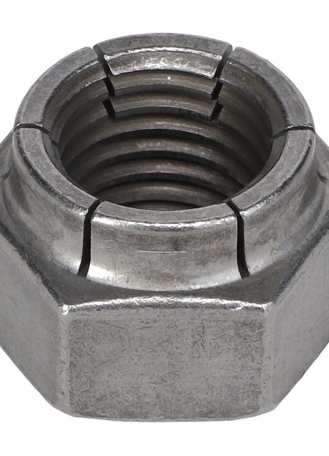A close-up of the AGCO HEX LOCKNUT - AG516176, showcasing its metallic hexagonal design with internal threading and a smooth surface with no visible notches.