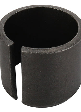 A black cylindrical metal object with a cut-out section, resembling a bushing or spacer. This item is the AGCO | Bush - Acw1043900 from the brand AGCO. No further product description information is available at this time.