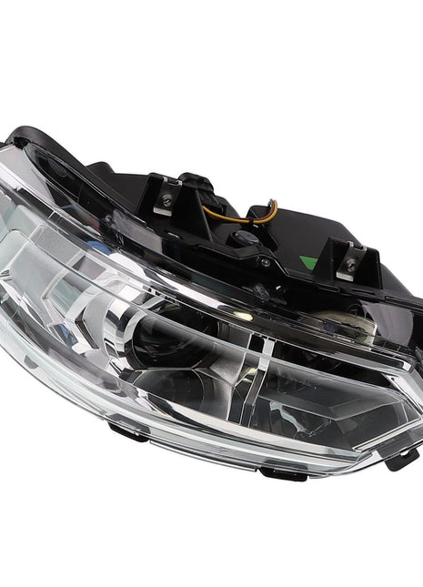 An angled view of an AGCO | Left Hand Light - Acx2430790 car headlight assembly, featuring a clear and black design with wiring. No current product description information available.