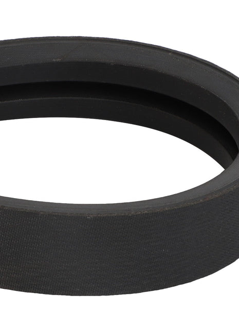 Close-up of the AGCO V Belt - D49030006, featuring a black rubber construction with a ridged inner surface and a smooth, flat outer surface. The belt is coiled in an oval shape, highlighting its robust design ideal for various mechanical applications.