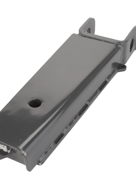 A gray metal automotive part featuring a flat rectangular body, a central hole, and two protruding arms on either end is the AGCO Bracket - Acw4962220.