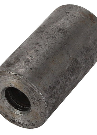 The AGCO Spacer Piece - V836328372 is a cylindrical metal spacer that features a threaded interior and a rugged exterior surface.