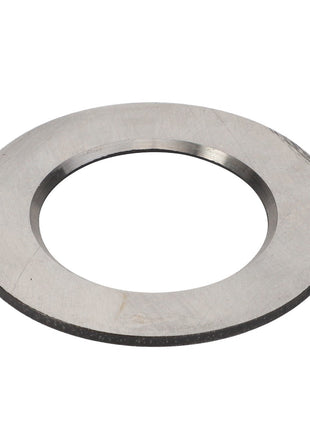 A metallic, circular flat washer with a central hole, viewed from an oblique angle. Product Name: AGCO | SHIM - V30903900. Brand Name: AGCO. No current product description information available for further details.