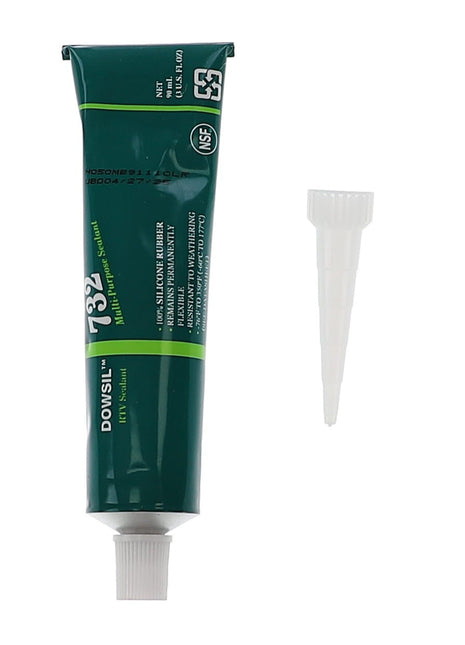 A sleek green tube of AGCO | Silicone Sealant - Acx3399030 awaits its next task, with a separate nozzle attachment ready for action beside it.