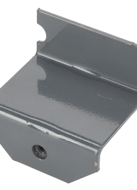 The AGCO BRACKET - D28785918 is a small, gray metal bracket with a flat base, two side tabs, and a single threaded hole in the center. No additional product description information is available at this time.