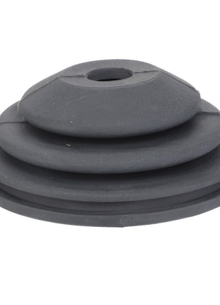 The AGCO | BELLOWS - F716974160020 is a sleek black rubber grommet that features a layered, conical shape with a central hole for versatile applications.