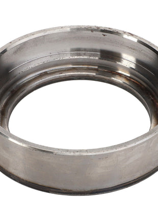 Close-up of the AGCO | Bearing - Acp0500460, a silver metal ring with inner and outer grooves, exhibiting a slightly weathered surface. No current product description available.