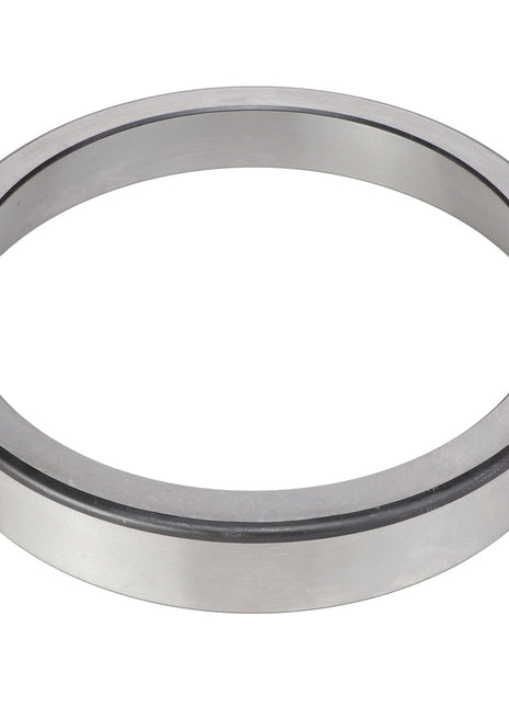 The AGCO | BEARING CUP - AG520700, a product by AGCO, features a smooth, circular metallic design and is perfect for handling radial loads when viewed from a slight angle.