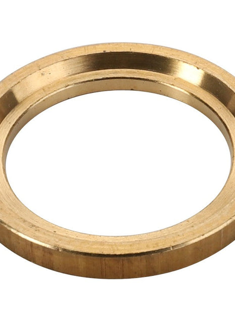 A detailed view of the AGCO BACKUP RING - CH185-9772, featuring a brass ring-shaped washer with a smooth finish and a subtle bevel on the inner edge.