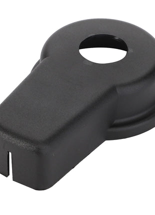 The AGCO | Cover - 816860100020, a precision-machined black plastic cover with an elongated shape and a central circular hole, is displayed against a white background, ensuring prolonged service life.